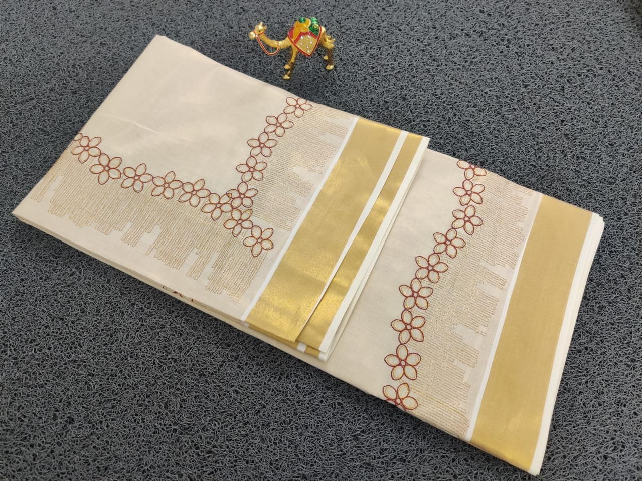 Flower Shed Golden tissue embroidered Saree